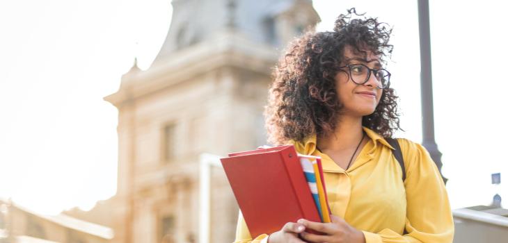 A girl with a book on her hands